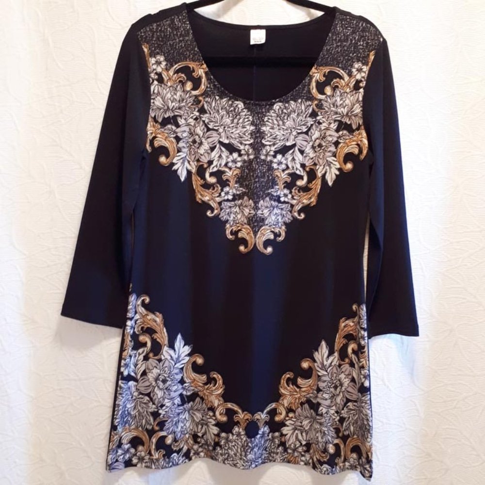 "Jockey Person to Person" tunic top. Size medium. Polyester/Spandex.